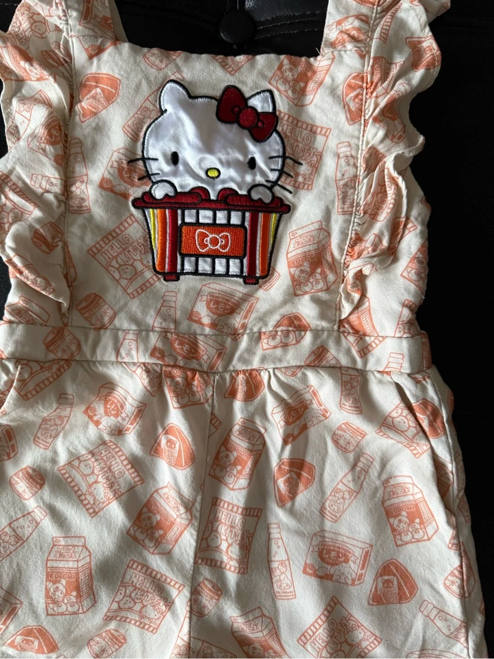 Hello Kitty Boxlunch Cream Overalls with Peach Print and Popcorn Patch